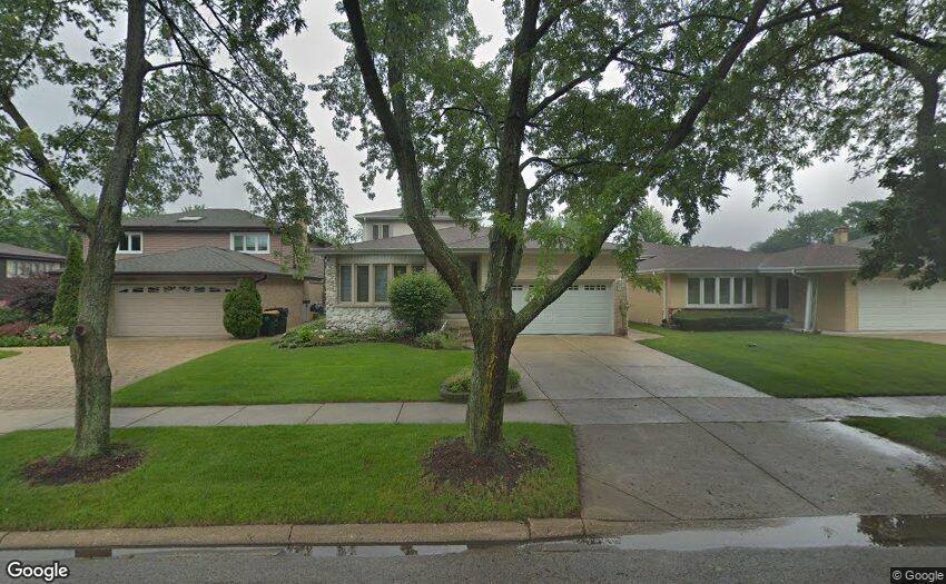 1809 South Washington Avenue Park Ridge, IL 60068 - Photo 1 of 1 a front view of a house with a garden