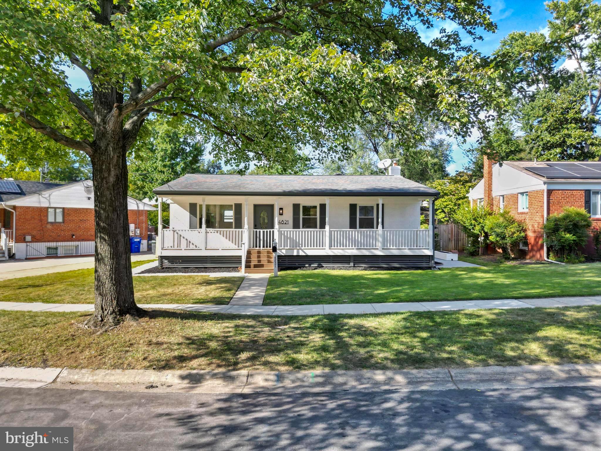 4821 Topping Road Rockville, MD 20852 - Photo 2 of 45 a view of a house with a yard balcony and a tree