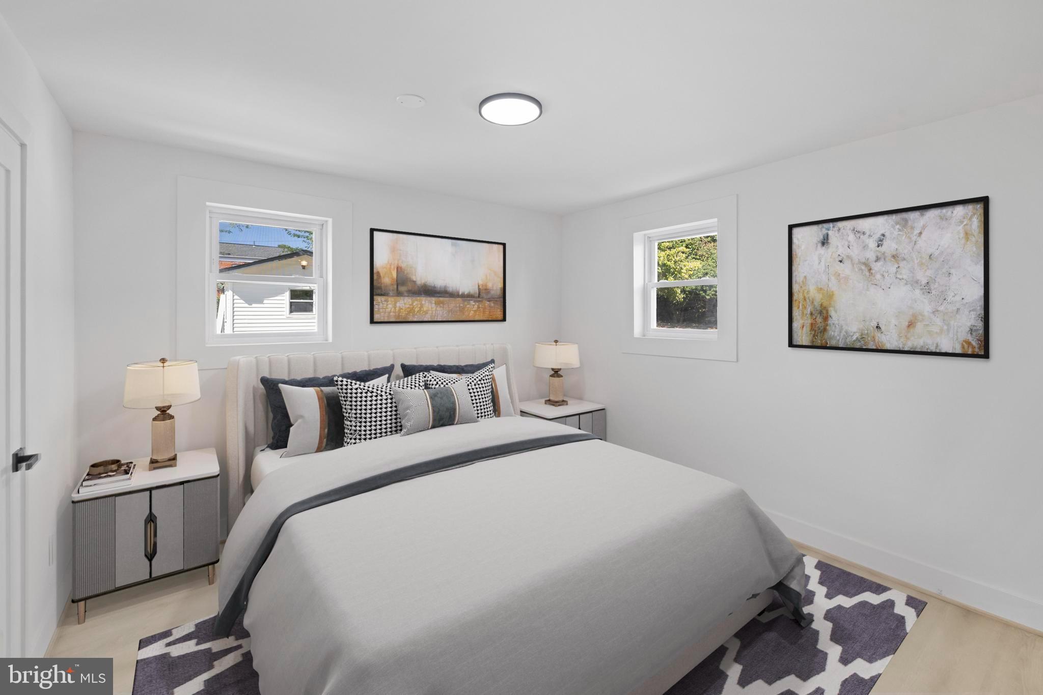 4821 Topping Road Rockville, MD 20852 - Photo 21 of 45 a bedroom with a bed and painting on the wall