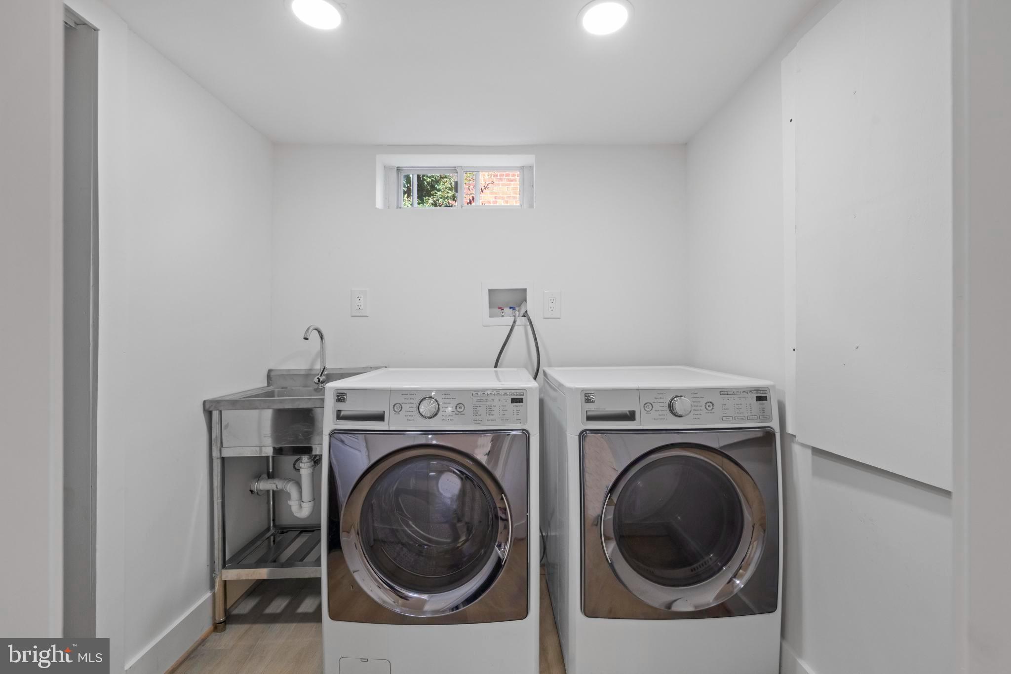 4821 Topping Road Rockville, MD 20852 - Photo 32 of 45 a utility room with dryer and washer