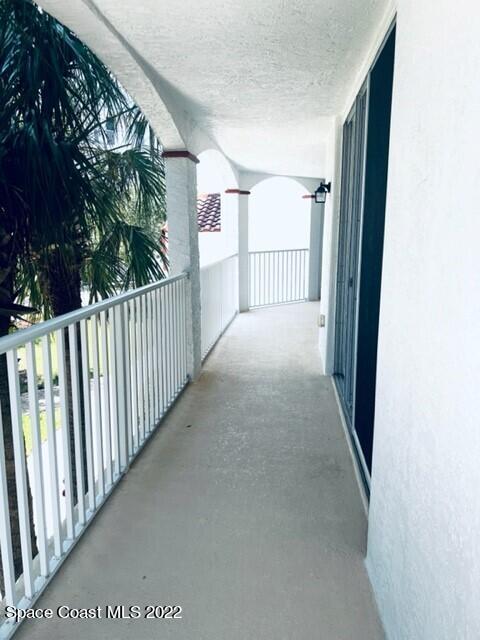 820 Del Rio Way, Unit 204 Merritt Island, FL 32953 - Photo 47 of 72 a view of a porch