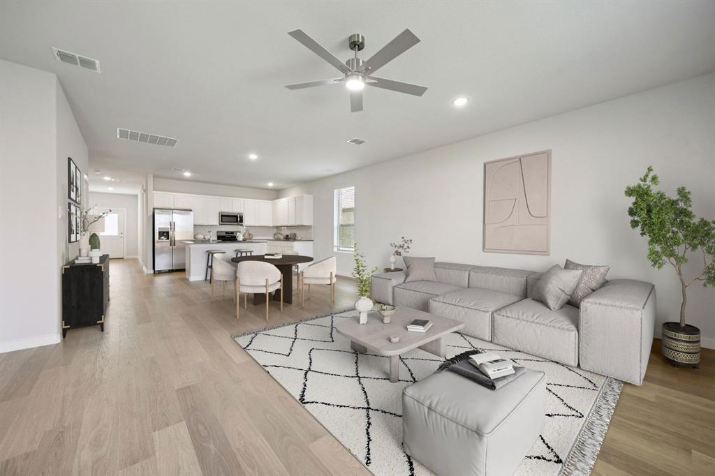 720 Poppy Lane Lavon, TX 75166 - Photo 11 of 36 Living Room in the Haylee home plan by Trophy Signature Homes - REPRESENTATIVE PHOTO