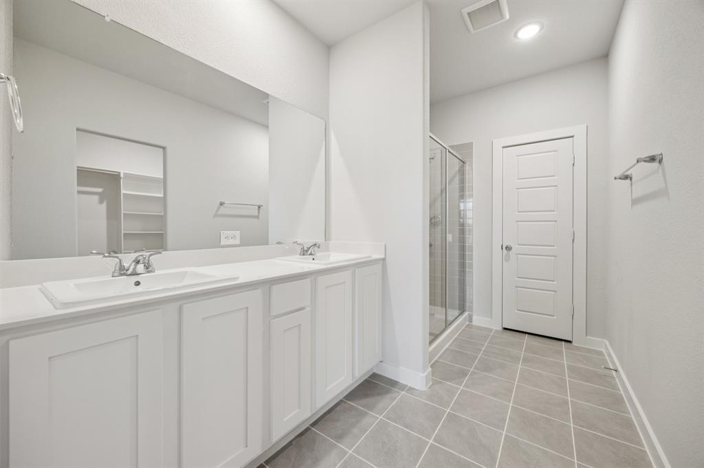 720 Poppy Lane Lavon, TX 75166 - Photo 21 of 36 Primary Bathroom in the Haylee home plan by Trophy Signature Homes - REPRESENTATIVE PHOTO