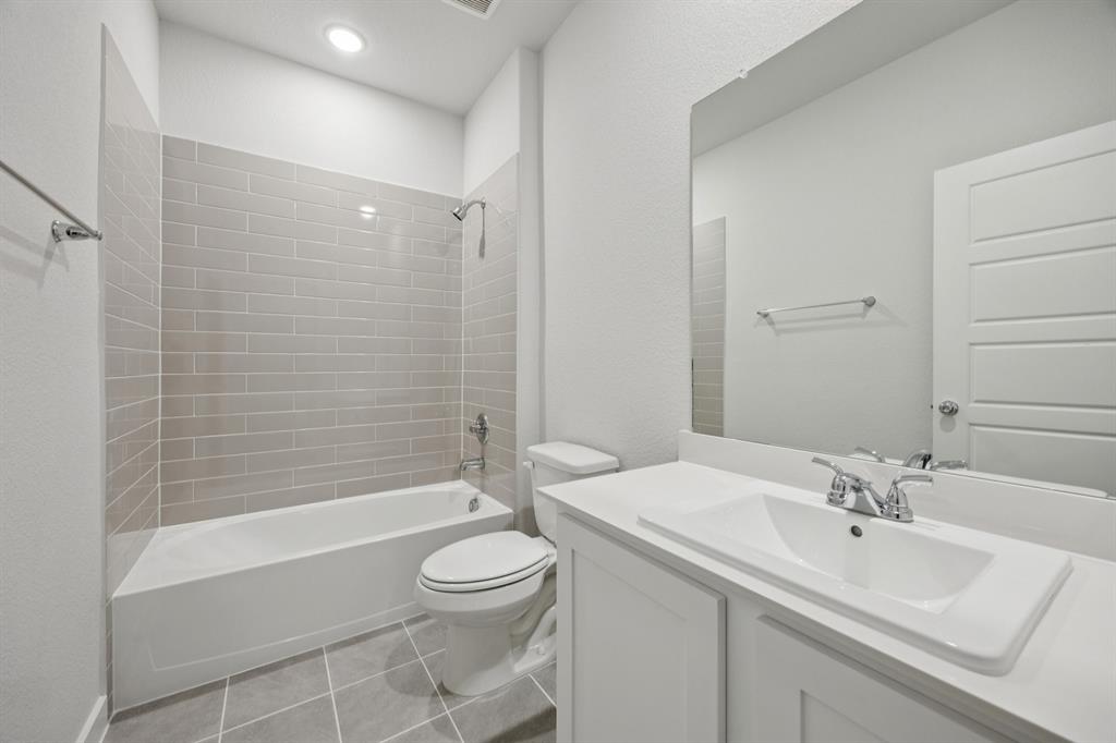 720 Poppy Lane Lavon, TX 75166 - Photo 29 of 36 Bathroom in the Haylee home plan by Trophy Signature Homes - REPRESENTATIVE PHOTO