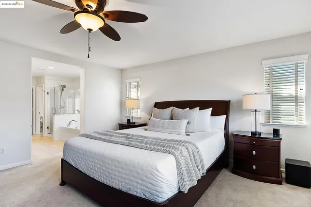 a bathroom with a sink double vanity and a mirror