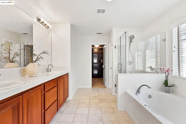 a view of a backyard with sitting area