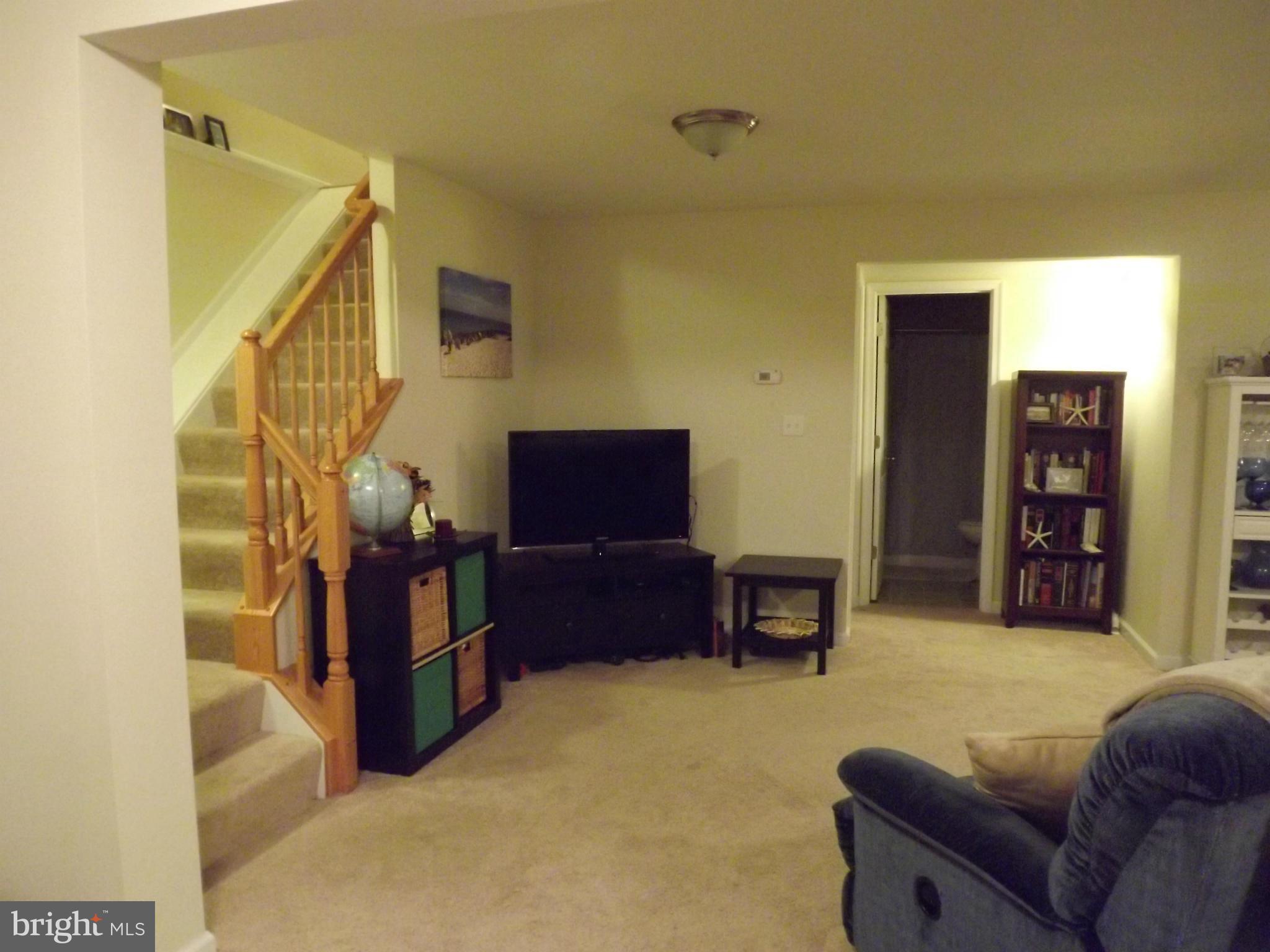 3167 Baybriar Road Baltimore, MD 21222 - Photo 2 of 30 a living room with furniture and a couch
