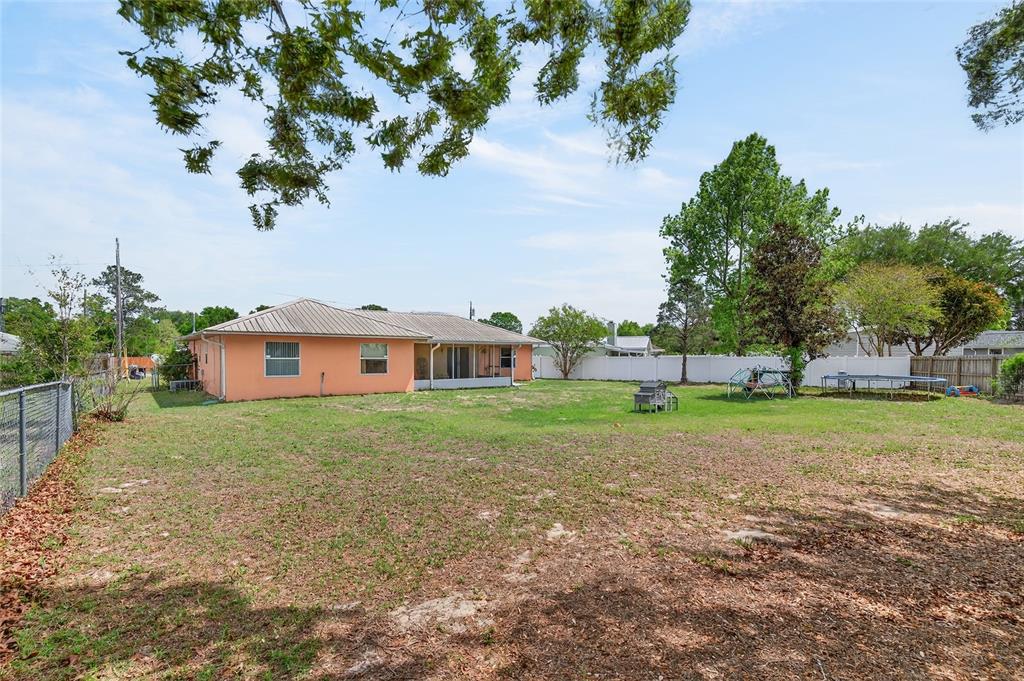 10 Almond Trace Ocala, FL 34472 - Photo 27 of 29 a view of a house with a yard