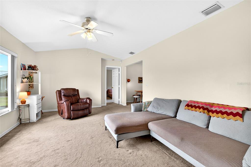 10 Almond Trace Ocala, FL 34472 - Photo 6 of 29 a living room with furniture and a couch