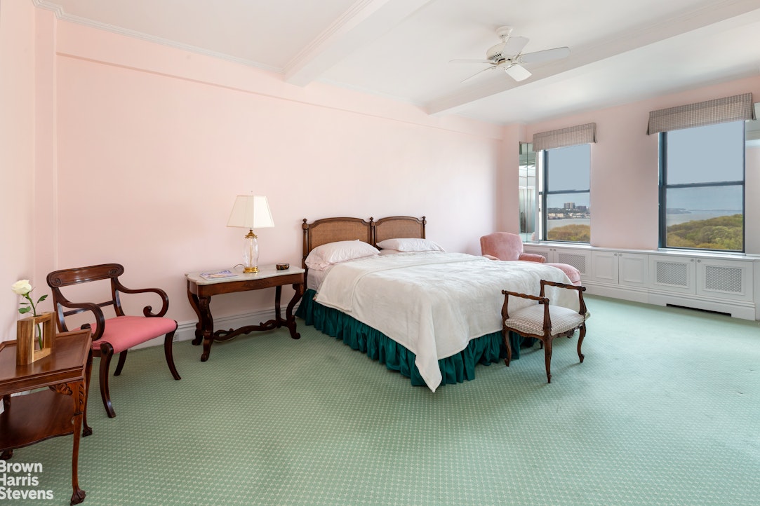37 Riverside Drive, Unit 10B Manhattan, NY 10023 - Photo 15 of 25 a bedroom with a bed chair and window