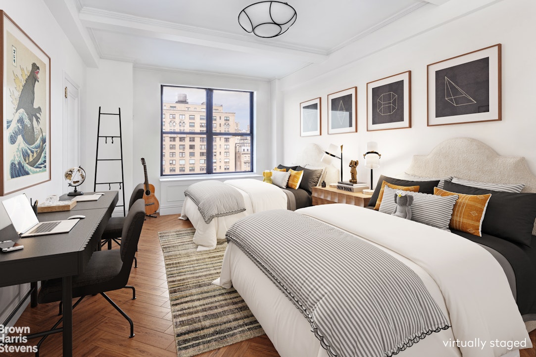 37 Riverside Drive, Unit 10B Manhattan, NY 10023 - Photo 6 of 25 a bedroom with two beds and a table
