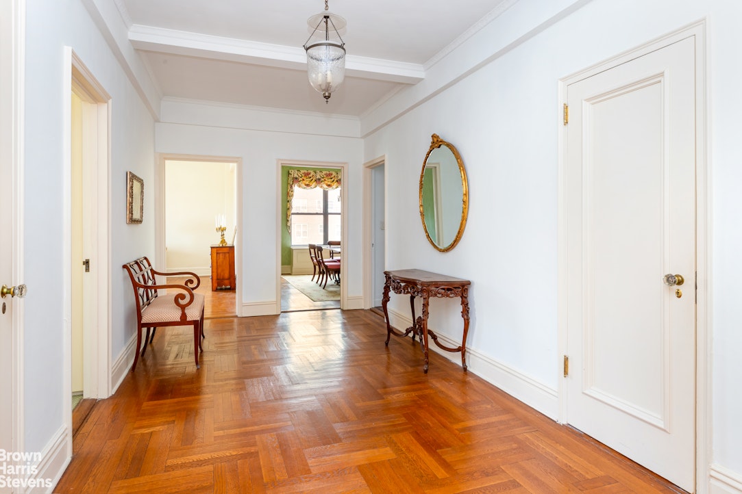 37 Riverside Drive, Unit 10B Manhattan, NY 10023 - Photo 8 of 25 a view of a livingroom with furniture and a window
