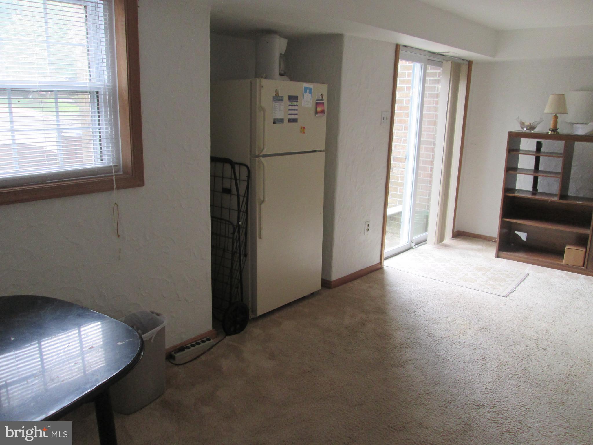 3721 Capulet Terrace, Unit 47 Silver Spring, MD 20906 - Photo 9 of 30 Family Room Walkout to Patio