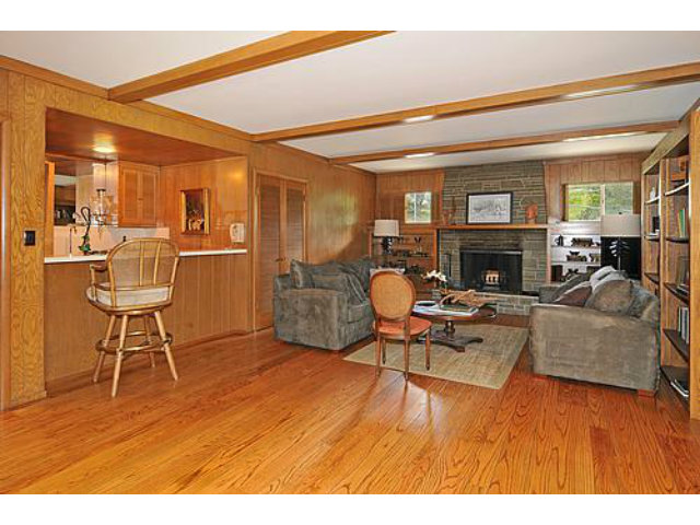 225 Robin Road Hillsborough, CA 94010 - Photo 12 of 18 a living room with furniture and a fireplace