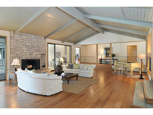 225 Robin Road Hillsborough, CA 94010 - Photo 4 of 18 a living room with furniture and a fireplace