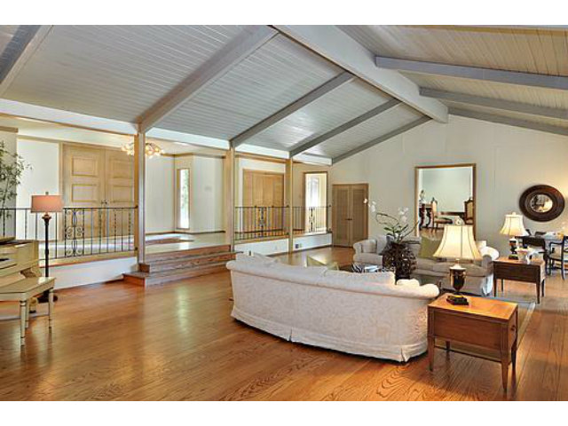 225 Robin Road Hillsborough, CA 94010 - Photo 5 of 18 a living room with furniture and a large window
