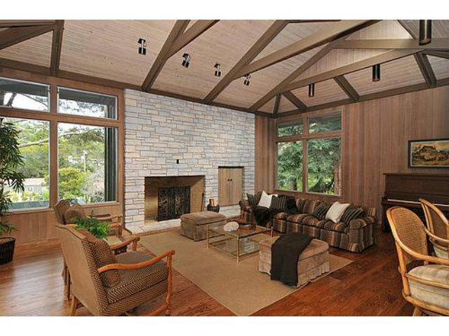 225 Robin Road Hillsborough, CA 94010 - Photo 10 of 18 a living room with furniture a fireplace and a large window