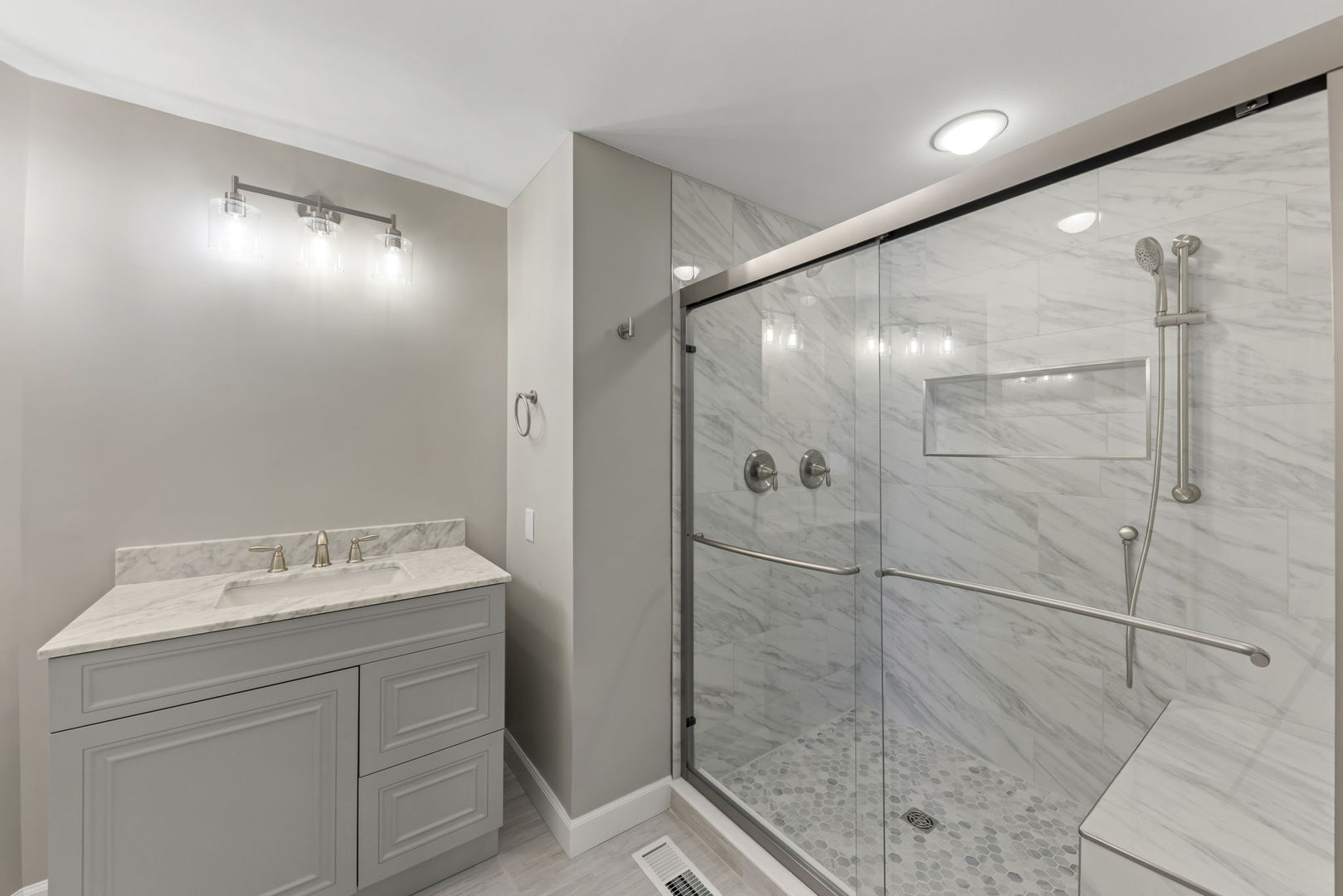 548 Jo Ann Court Lockport, IL 60441 - Photo 12 of 20 a bathroom with a sink and mirror