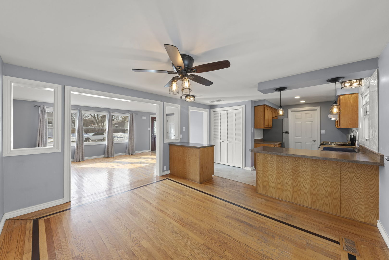 548 Jo Ann Court Lockport, IL 60441 - Photo 7 of 20 a view of kitchen with cabinets and wooden floor