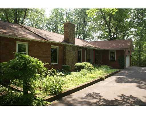 60 Ronda Lane Indiana, PA 15701 - Photo 10 of 17 Exterior Front. A gardeners dream! Front entry to slate foyer.
