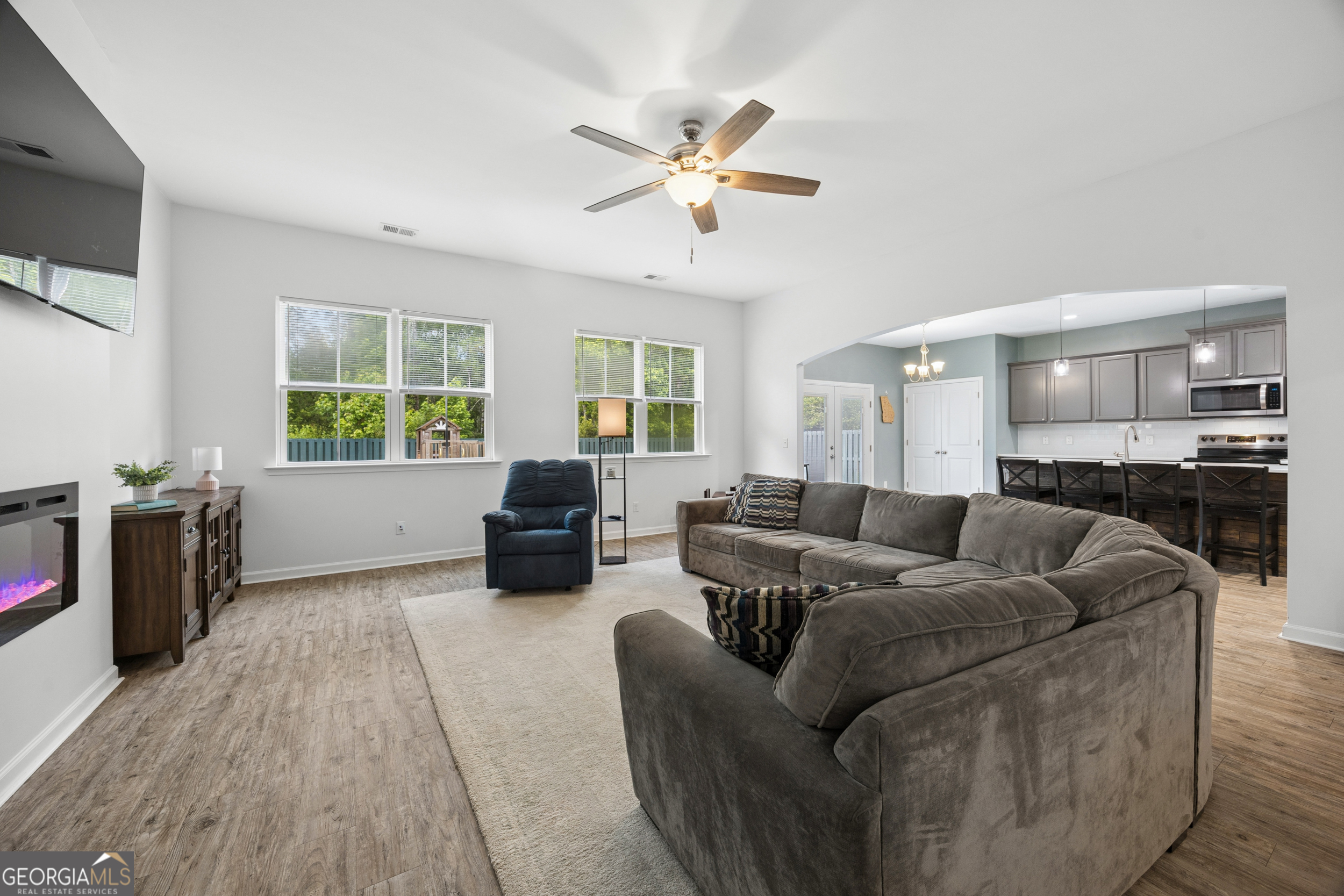 369 Waybridge Way Richmond Hill, GA 31324 - Photo 8 of 40 a living room with furniture and a window