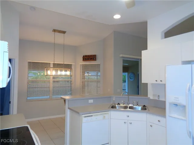 a bathroom with a sink double vanity and a mirror