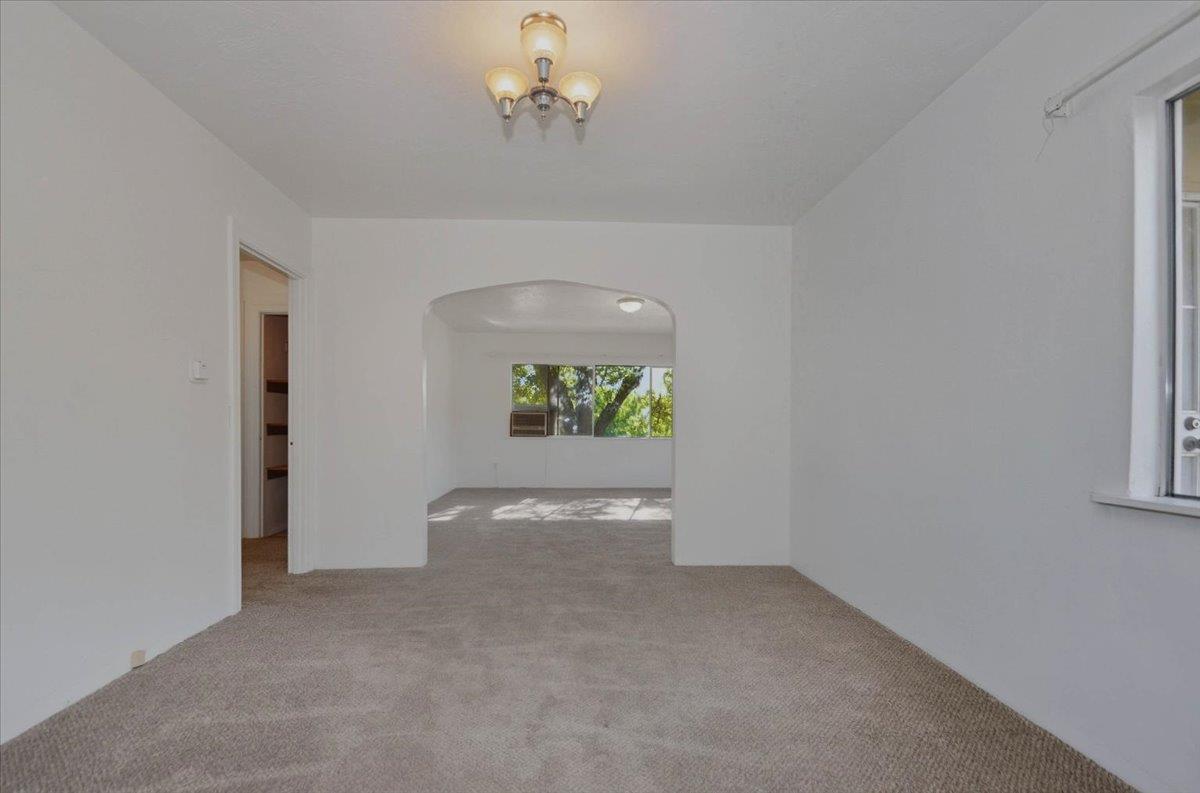 90 Gopher Flat Road Sutter Creek, CA 95685 - Photo 12 of 43 wooden floor in an empty room with a window