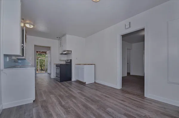 a view of a hallway with closet area