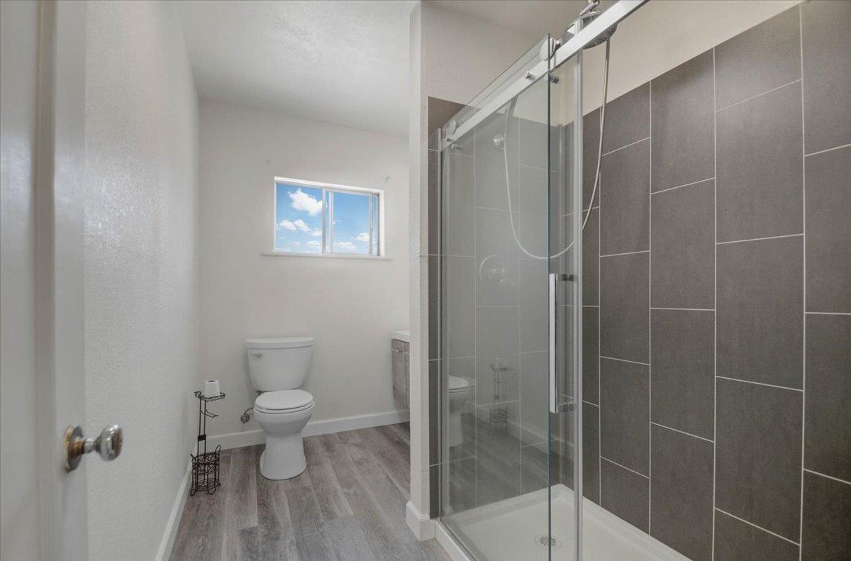 90 Gopher Flat Road Sutter Creek, CA 95685 - Photo 25 of 43 a bathroom with a toilet and a shower