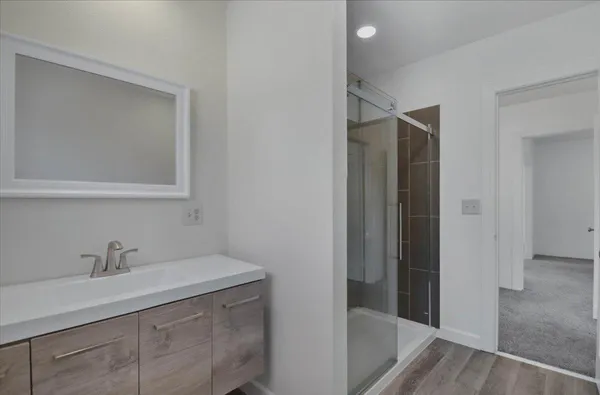 a view of a house with basketball court