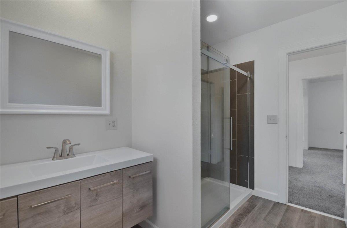90 Gopher Flat Road Sutter Creek, CA 95685 - Photo 26 of 43 a bathroom with a sink and mirror