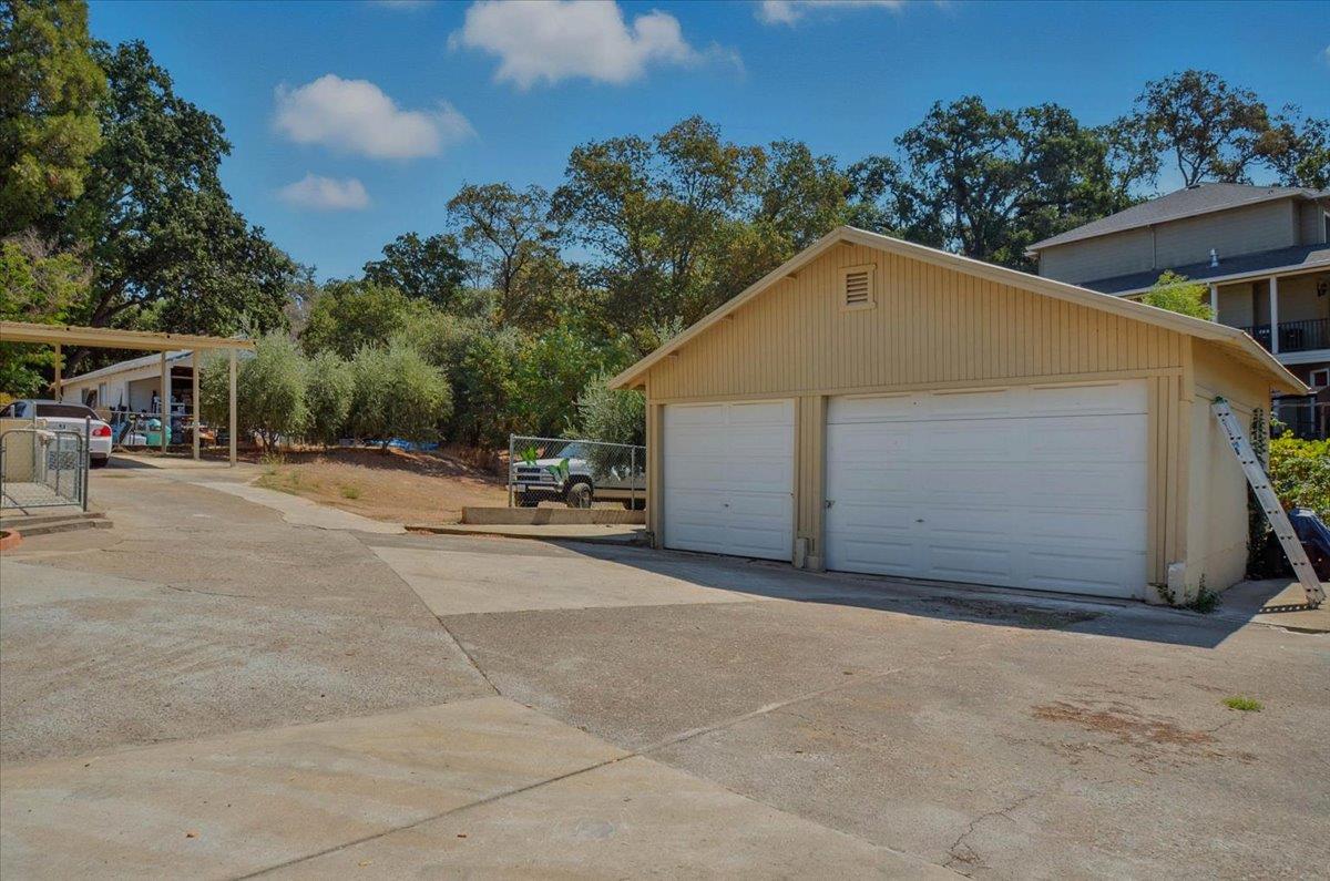 90 Gopher Flat Road Sutter Creek, CA 95685 - Photo 34 of 43 a view of a house with basketball court