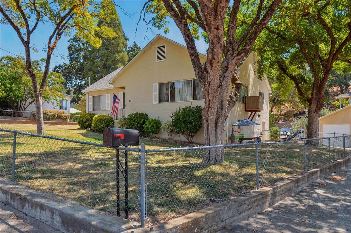 90 Gopher Flat Road Sutter Creek, CA 95685 - Photo 38 of 43 a view of a house with street next to a road