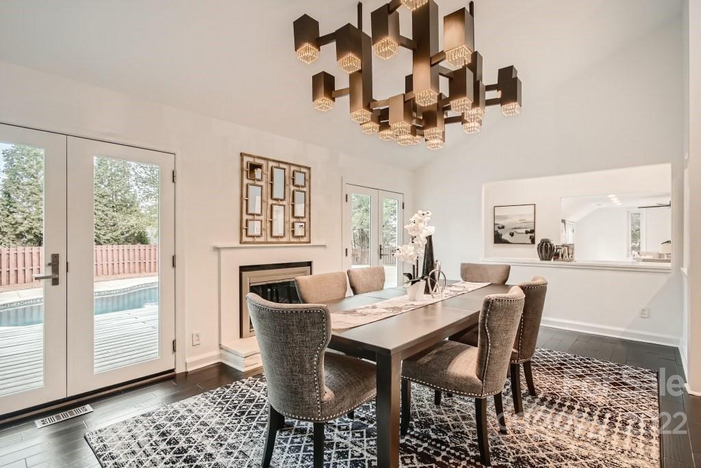 8000 Rising Meadow Road Charlotte, NC 28277 - Photo 6 of 28 a view of a dining room with furniture window and wooden floor