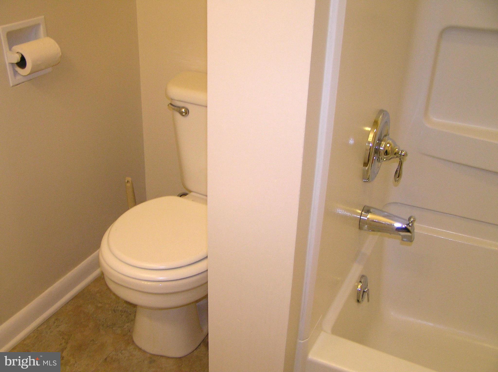 4611 Bethlehem Road Preston, MD 21655 - Photo 25 of 26 a bathroom with a sink and a toilet