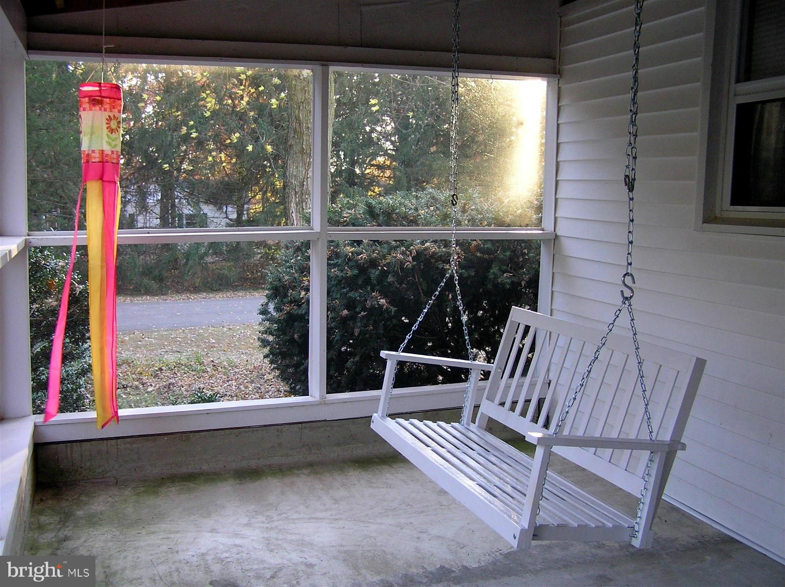 4611 Bethlehem Road Preston, MD 21655 - Photo 8 of 26 a view of porch with a bench