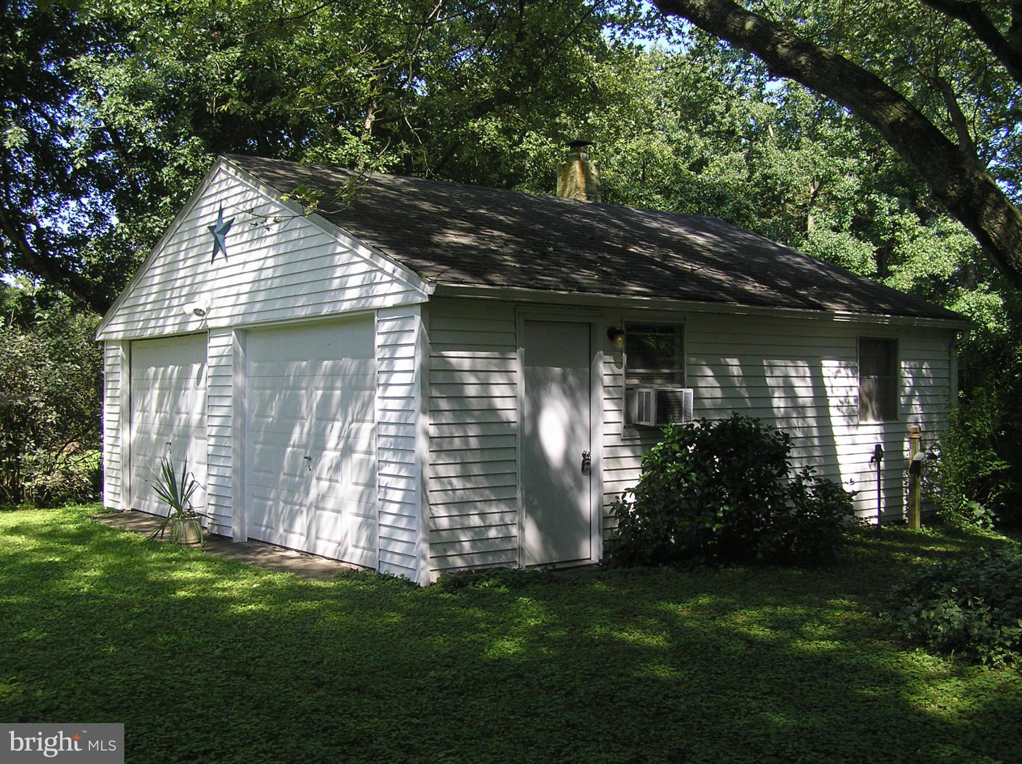 4611 Bethlehem Road Preston, MD 21655 - Photo 10 of 26 a front view of house with a garden