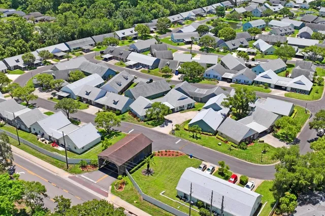 an aerial view of a house with a garden