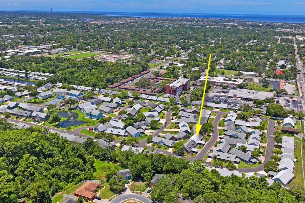 6702 Dartmoor Lane, Unit 7A New Port Richey, FL 34653 - Photo 28 of 40 an aerial view of multiple house