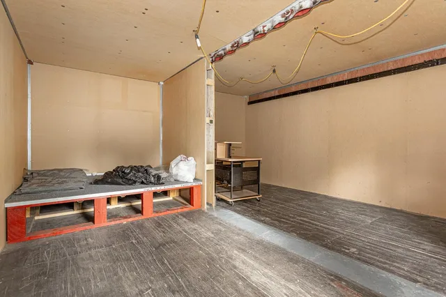 a living room with a wooden floor