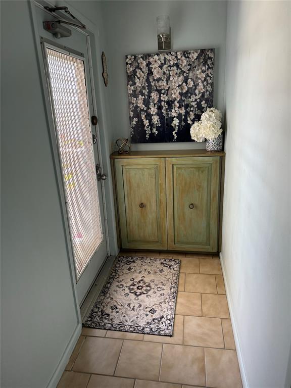 4054 Exeter, Unit C Boca Raton, FL 33434 - Photo 3 of 13 a view of entryway with window