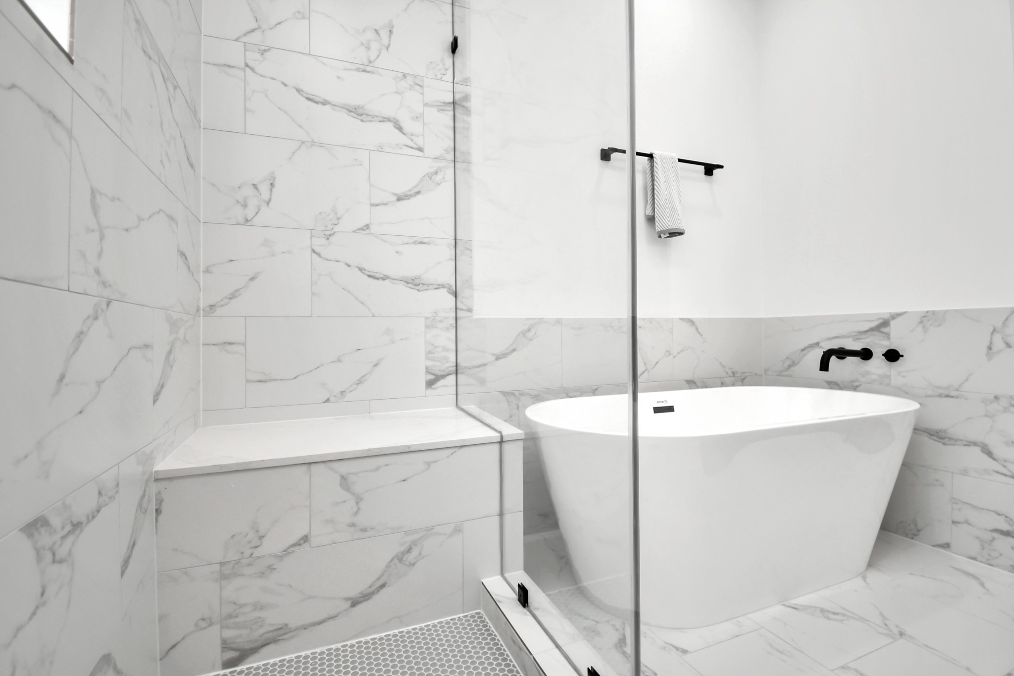 4804 Elysian Street, Unit D Houston, TX 77009 - Photo 32 of 44 a bathroom with a bathtub and shower