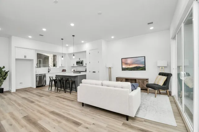 a living room with furniture and a table