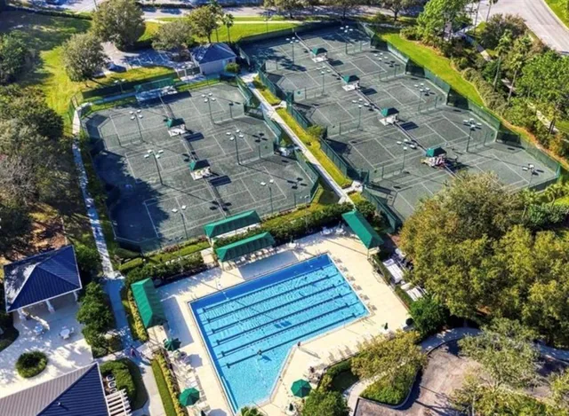 an aerial view of a house with a garden