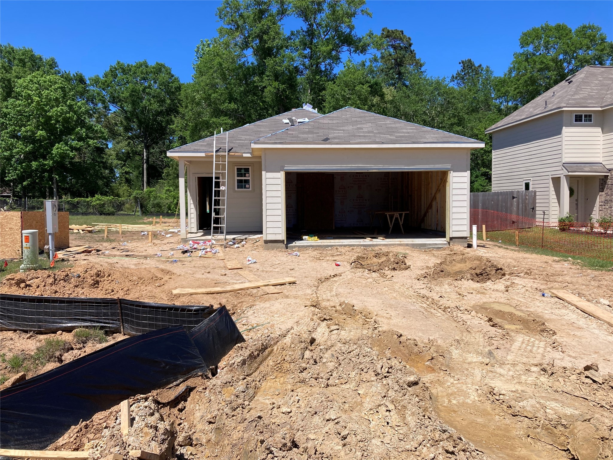 17817 Lionheart Road Conroe, TX 77306 - Photo 18 of 23 a front view of a house with a yard