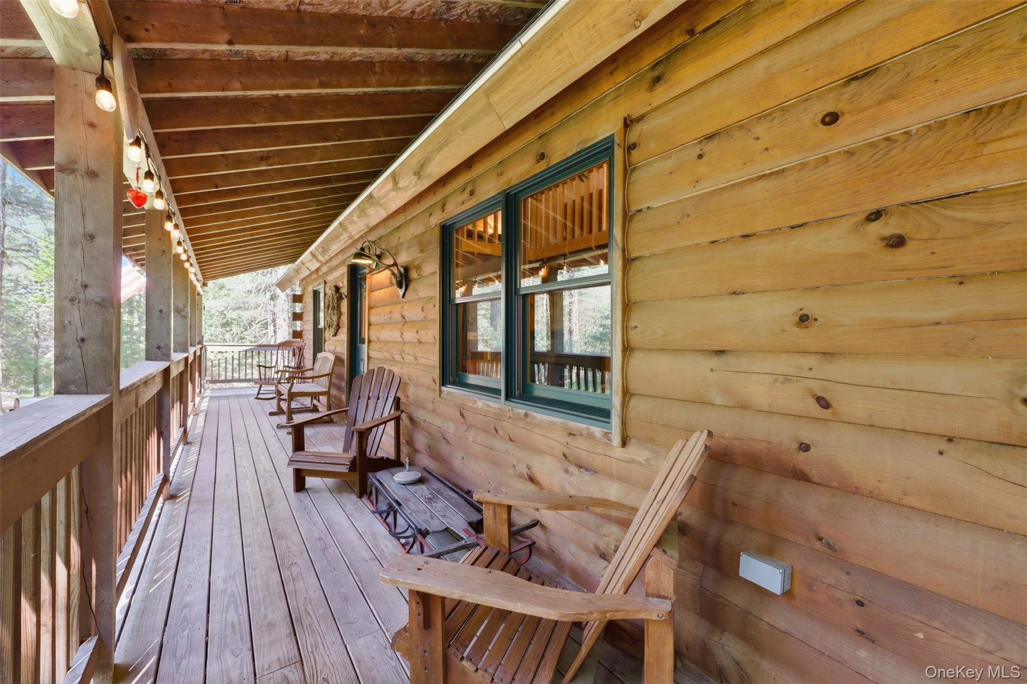 301 Pucky Huddle Road Bethel, NY 12720 - Photo 34 of 39 Large covered wrap around deck
