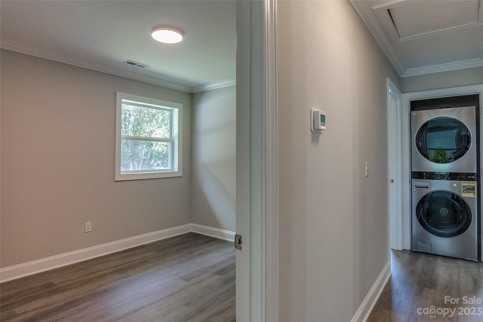 1531 Ruth Street, Unit 2 Lancaster, SC 29720 - Photo 11 of 33 a view of a hallway with washer and dryer