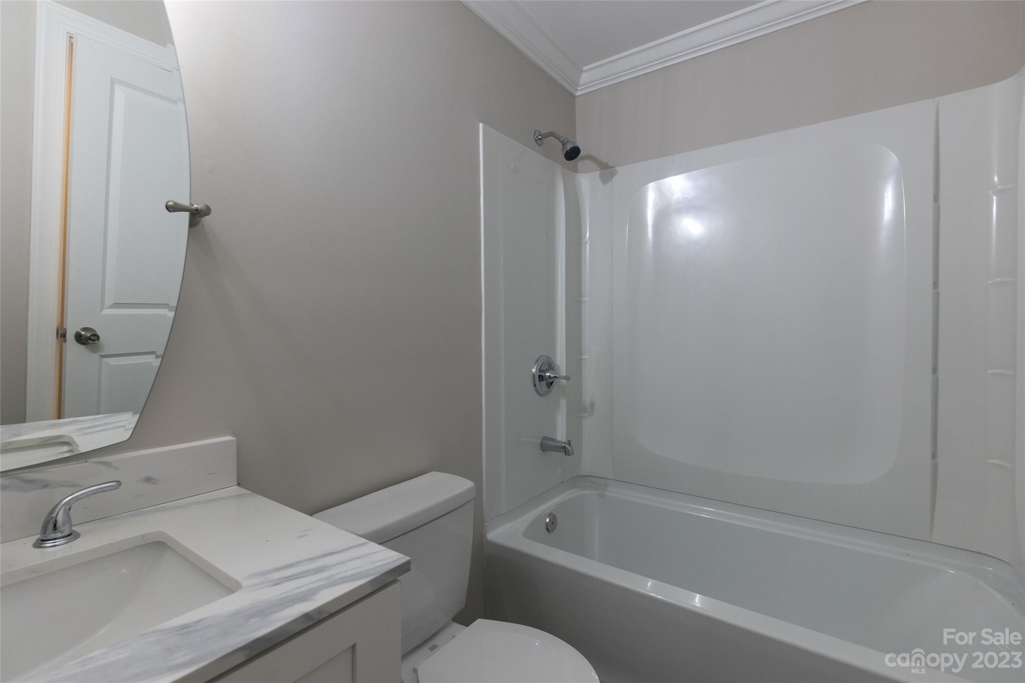 1531 Ruth Street, Unit 2 Lancaster, SC 29720 - Photo 14 of 33 a bathroom with a sink mirror toilet and bathtub