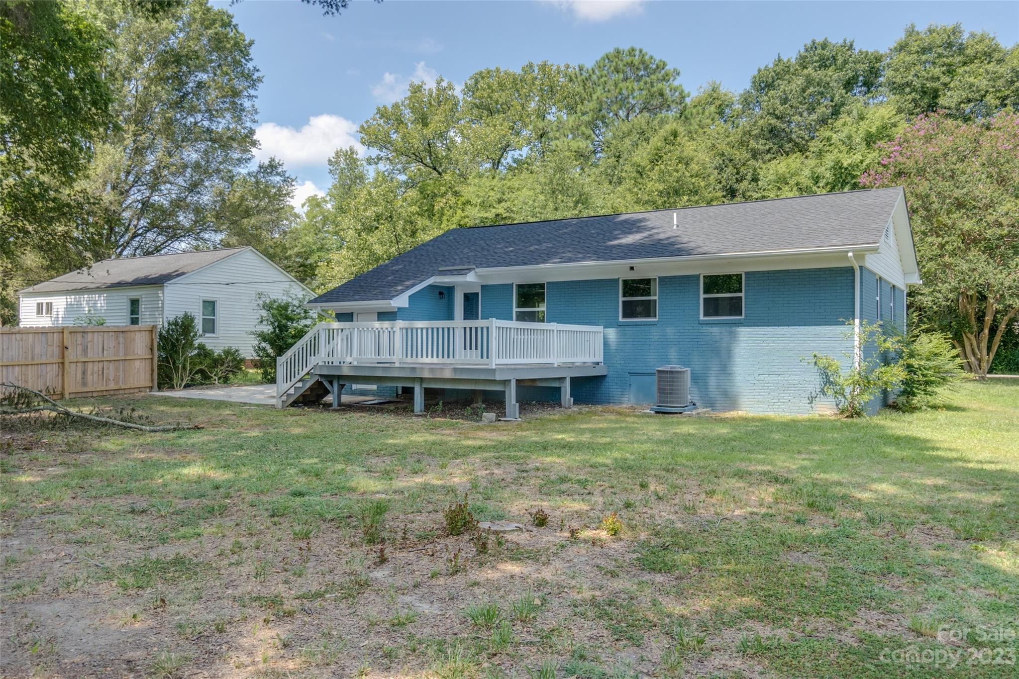 1531 Ruth Street, Unit 2 Lancaster, SC 29720 - Photo 31 of 33 a house with trees in the background