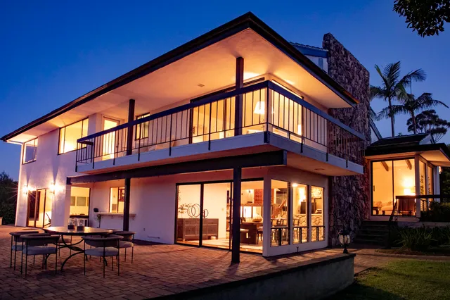 a view of living room with furniture and floor to ceiling window